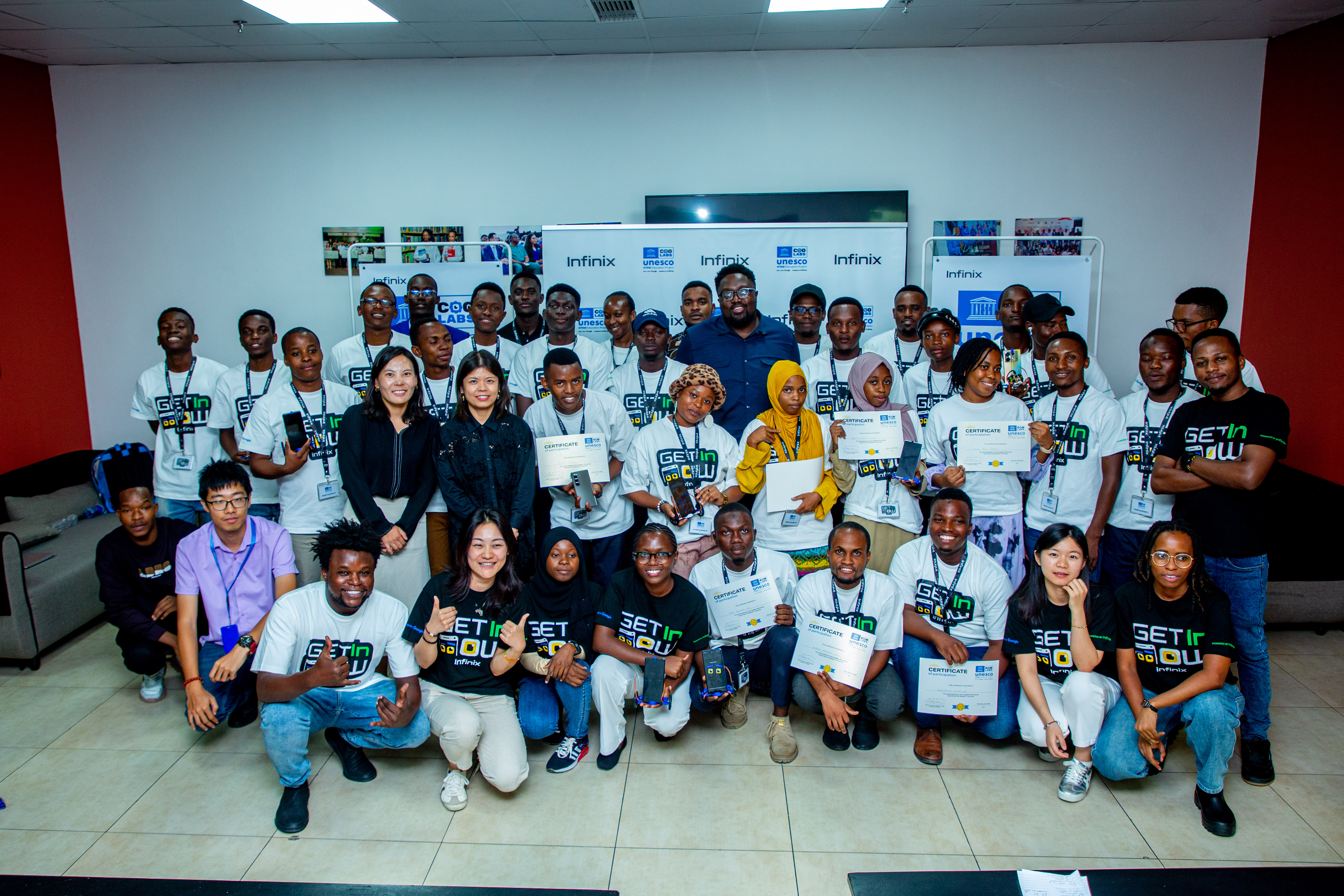 A student programming an E3Bot